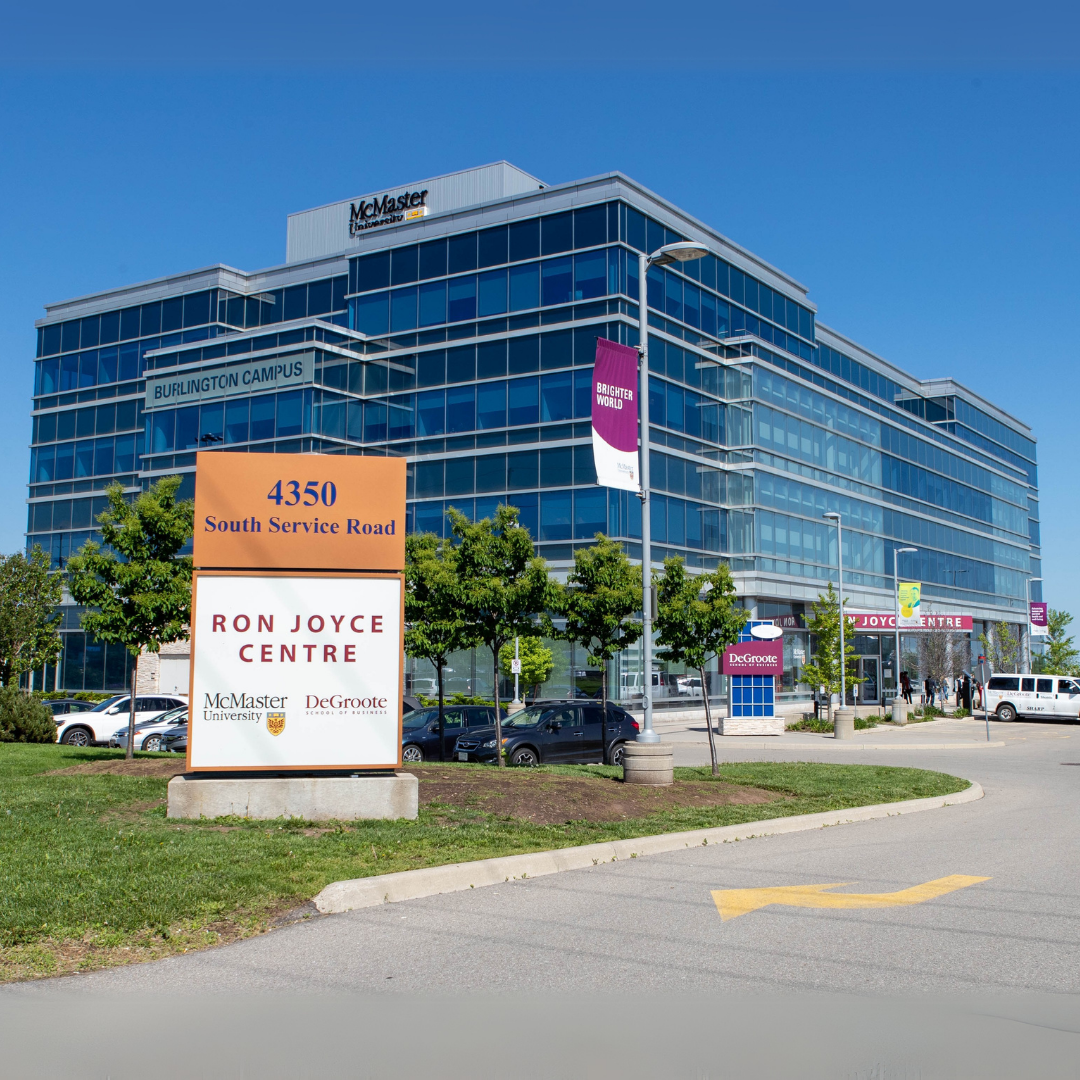 Exterior view of the Ron Joyce Centre building featuring a prominent sign with its name.